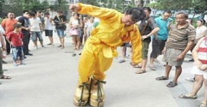 Chinese man's iron shoes up for Guinness record