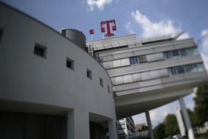 The logo of Deutsche Telekom AG is seen on top of the company's headquarter in Bonn