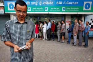 Banks, ATMs mobbed for third day