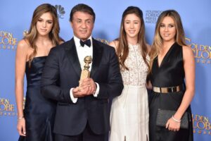 BEVERLY HILLS, CA - JANUARY 10: Actor Sylvester Stallone (C), winner of the award for Best Performance by an Actor in a Supporting Role in any Motion Picture for 