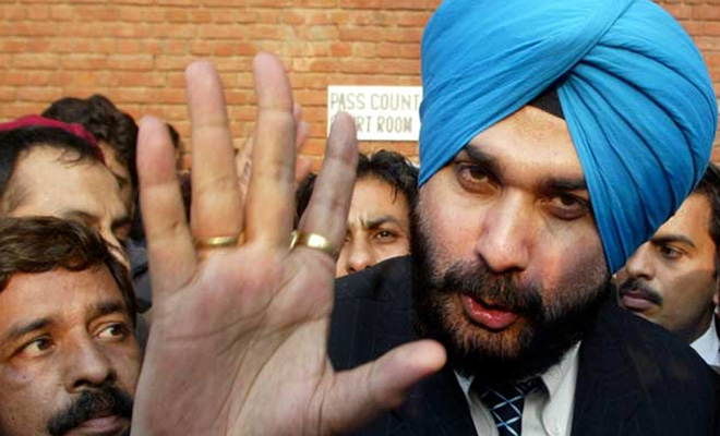 Sidhu calls off fast-unto-death over funds for Amritsar after an assurance from Badal