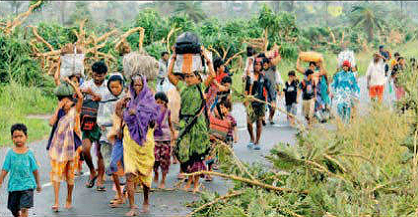 9 lakh evacuated from path of Cyclone Phailin, death toll limited to 23