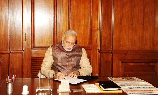 Narendra Modi takes charge as PM