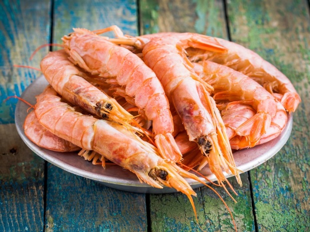 US cuts obligation barrier on shrimp import