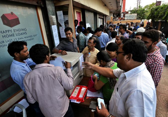 Lengthy queues proceed outdoors banks, ATMs